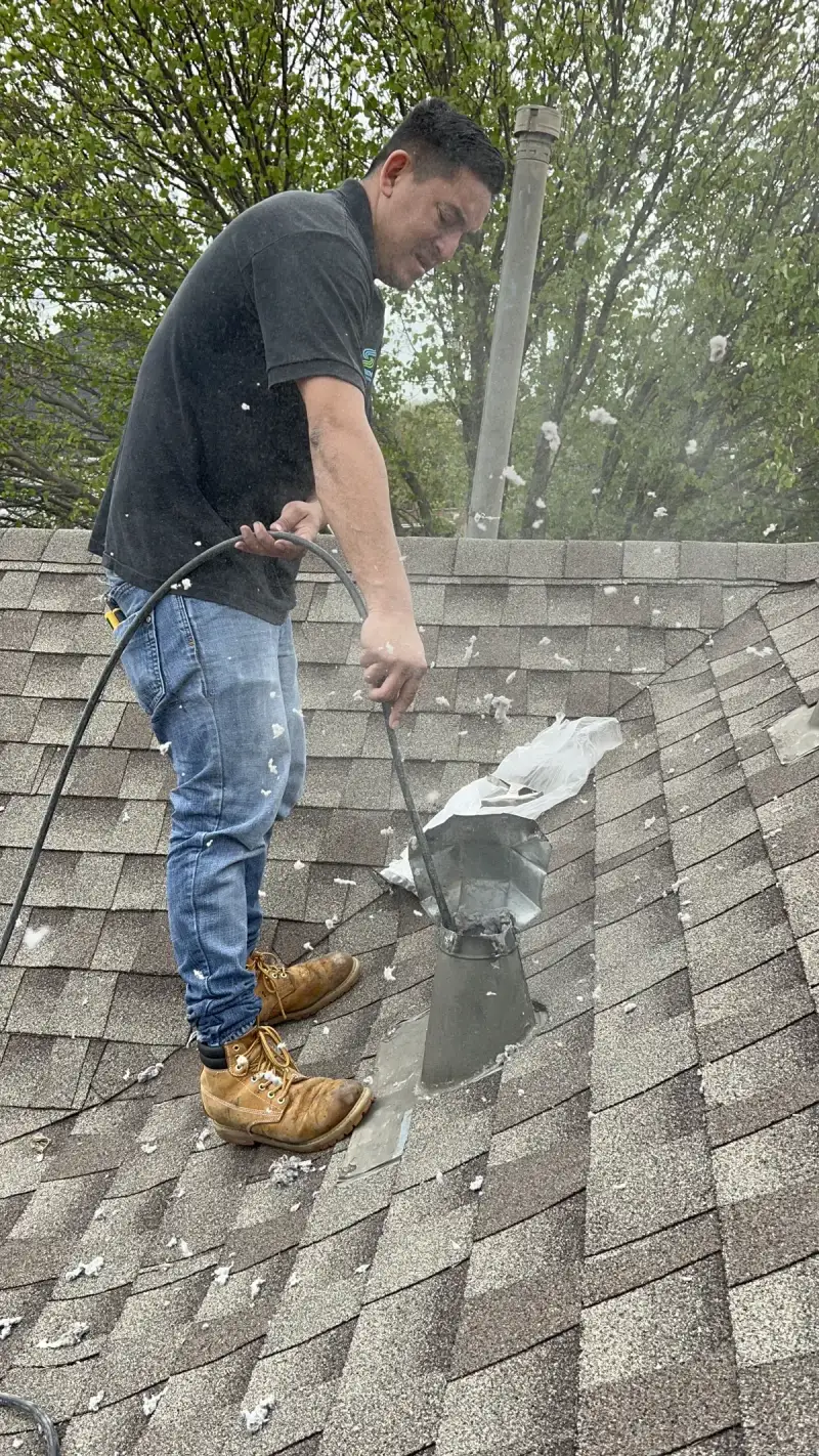 Dryer vent lint removal during professional cleaning service in Austin, TX