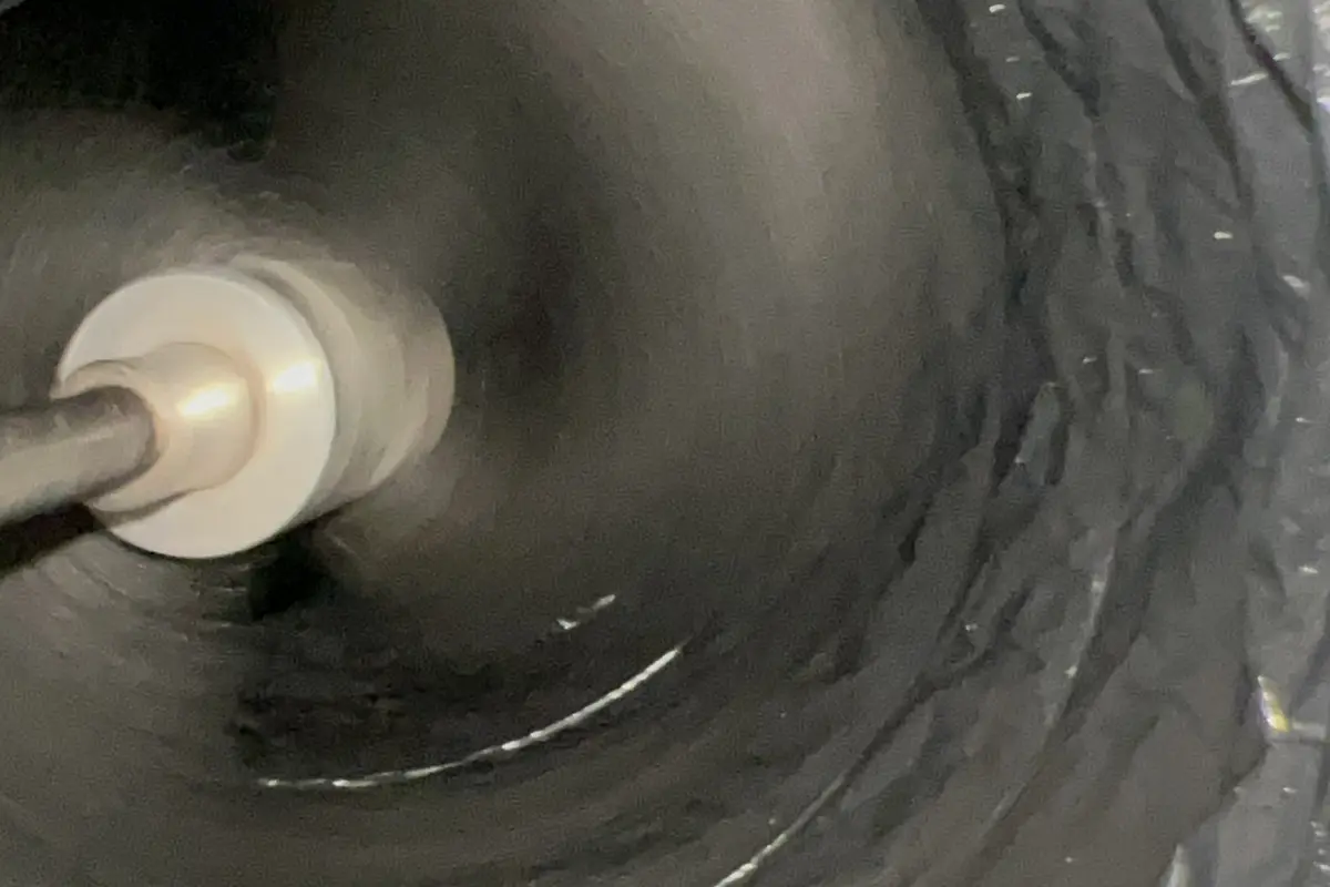 HD camera inspection inside air duct during professional cleaning