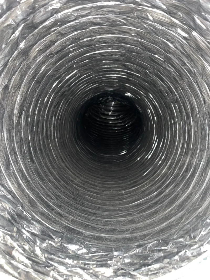 Completed air duct cleaning results showing spotless vents in Austin TX home