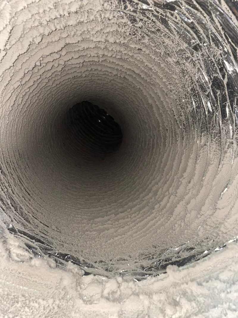 Air Central tech performing step-by-step duct inspection in Austin home