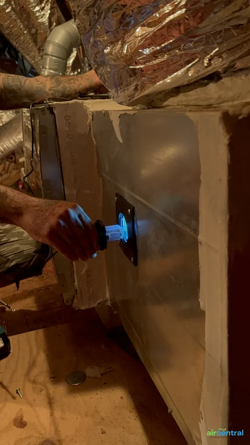 Active UV-C light purifying air inside Austin TX HVAC system