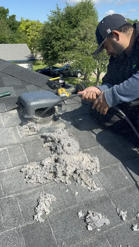 Air Central technician cleaning dryer vent