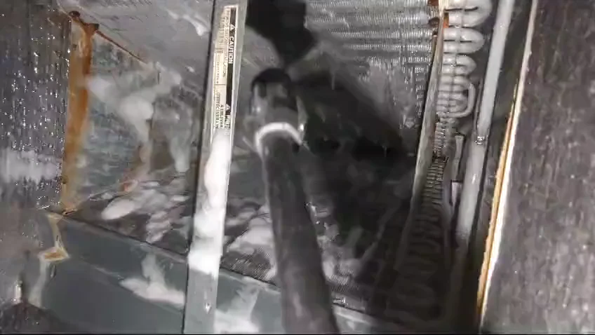 Evaporator coil cleaning with UV-C